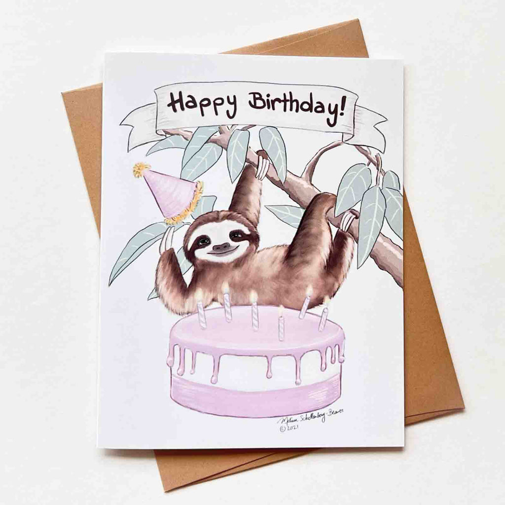 a birthday card featuring a sloth hanging over a birthday cake