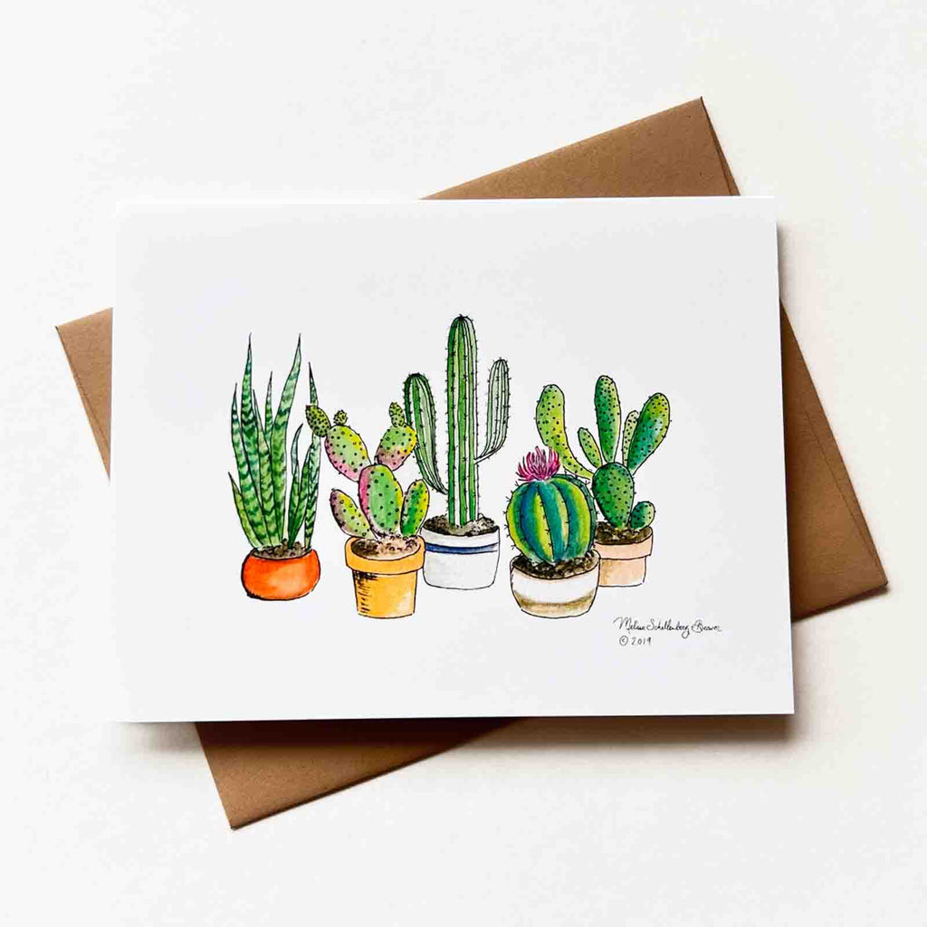 a botanical themed notecard featuring 3 potted cactus plants