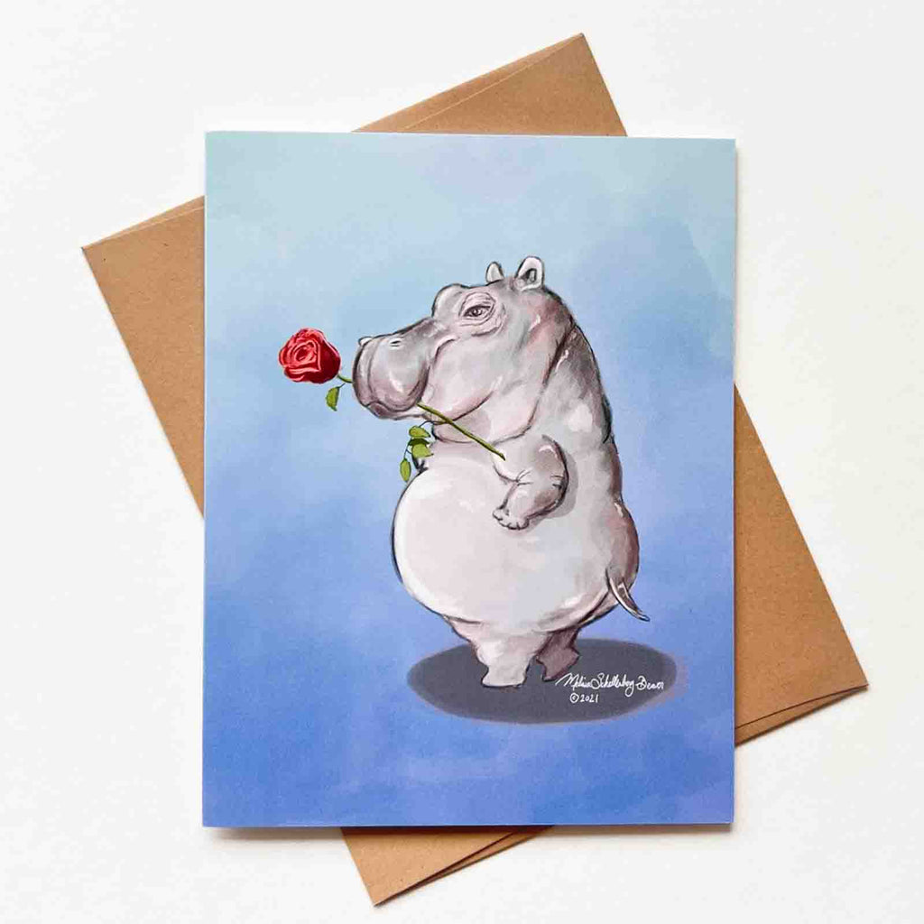 a love card featuring a flirtatious hippopotamous in a sexy pose with a rose between his teeth