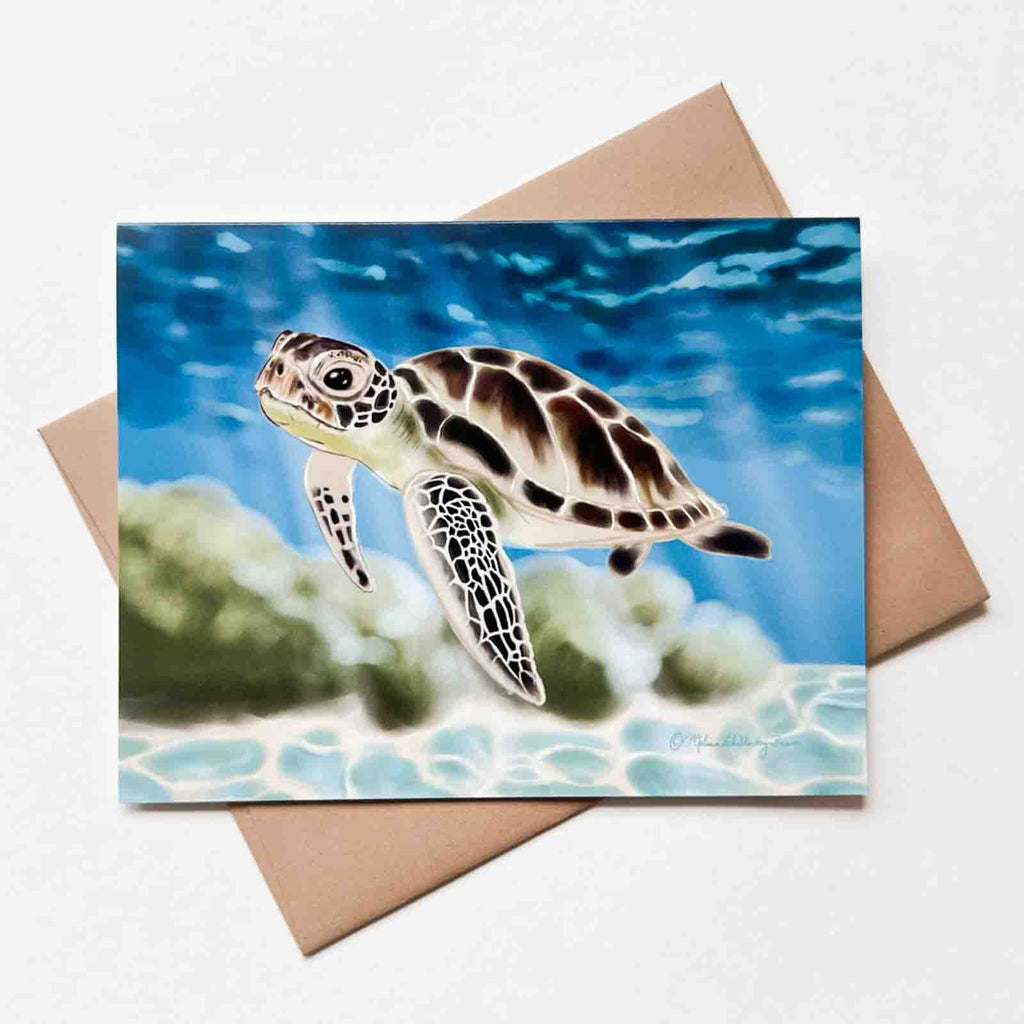 A greeting card featuring a happy sea turtle swimming in the deep blue sea