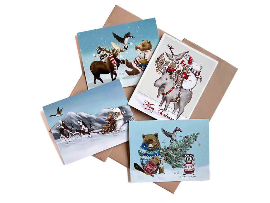 a pack of Candian themed holiday / Christmas cards featuring a polar bear, brown bear, moose, raccoon, Canada goose, husky dogs, and a beaver. 