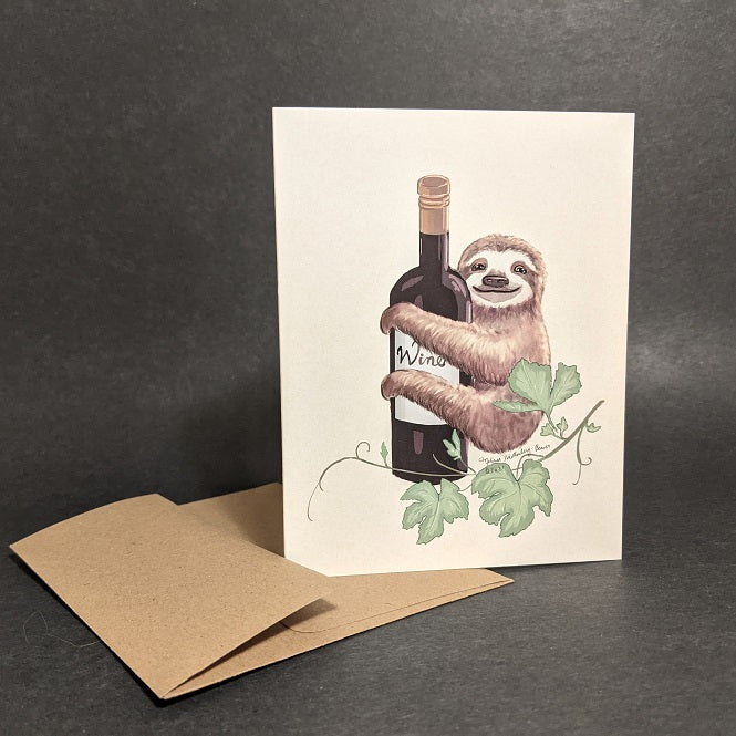 a greeting card featuring a sloth hugging a bottle of wine