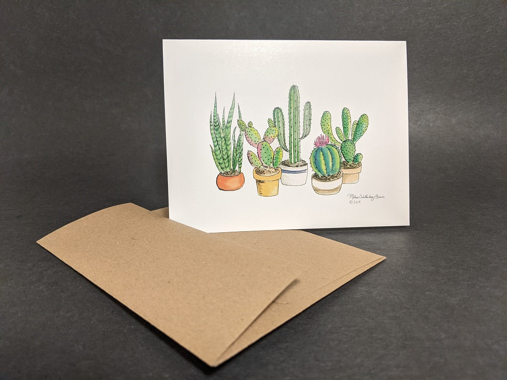 a botanical themed notecard featuring 3 potted cactus plants