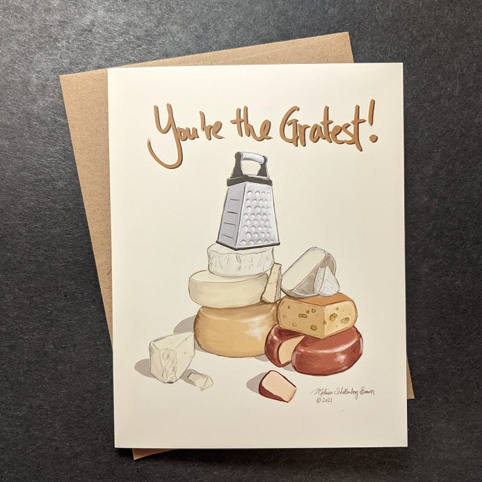 a punny greeting card featuring a stack of various cheeses with a cheese grater sitting on the top